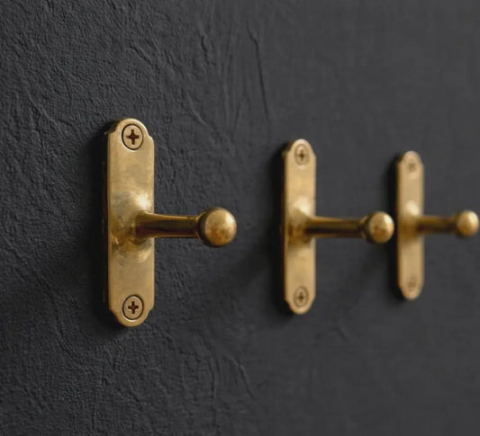 vintage brass wall hook close up detail