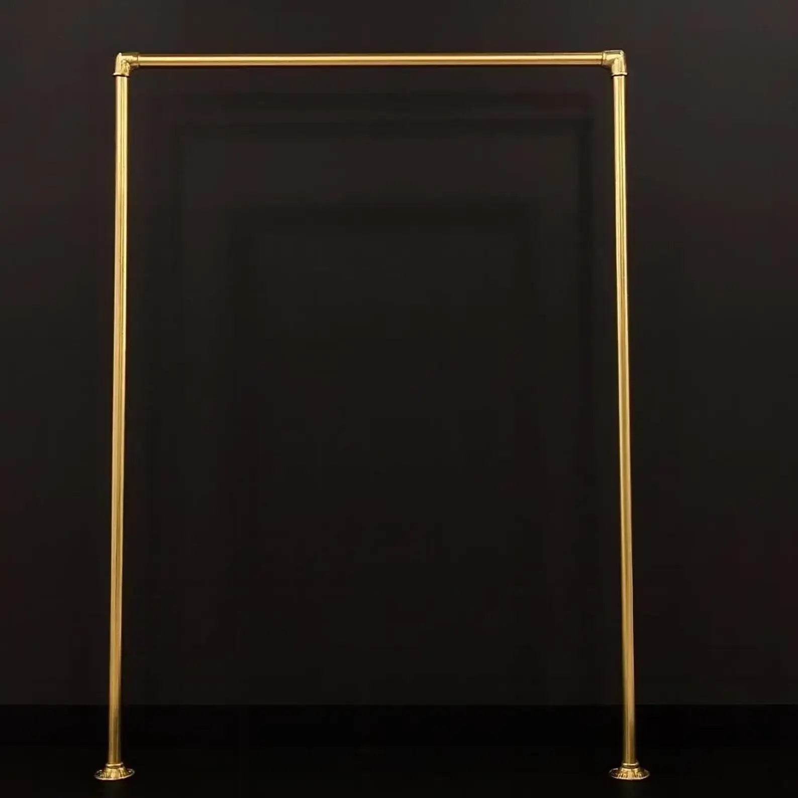 floor mounted brass clothes rack modern interior