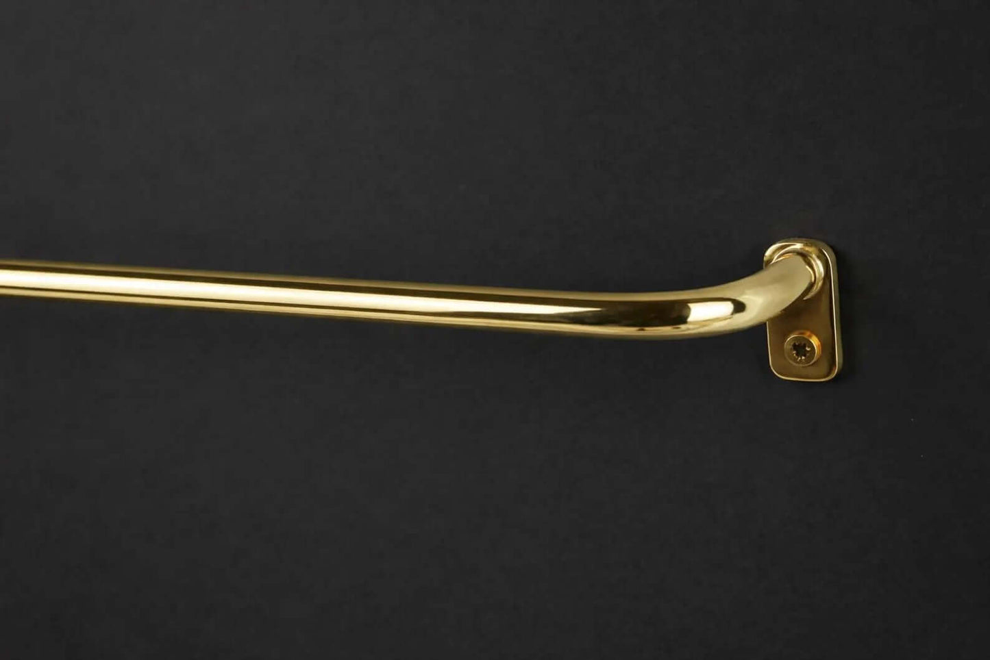 thin solid brass curtain rod installation