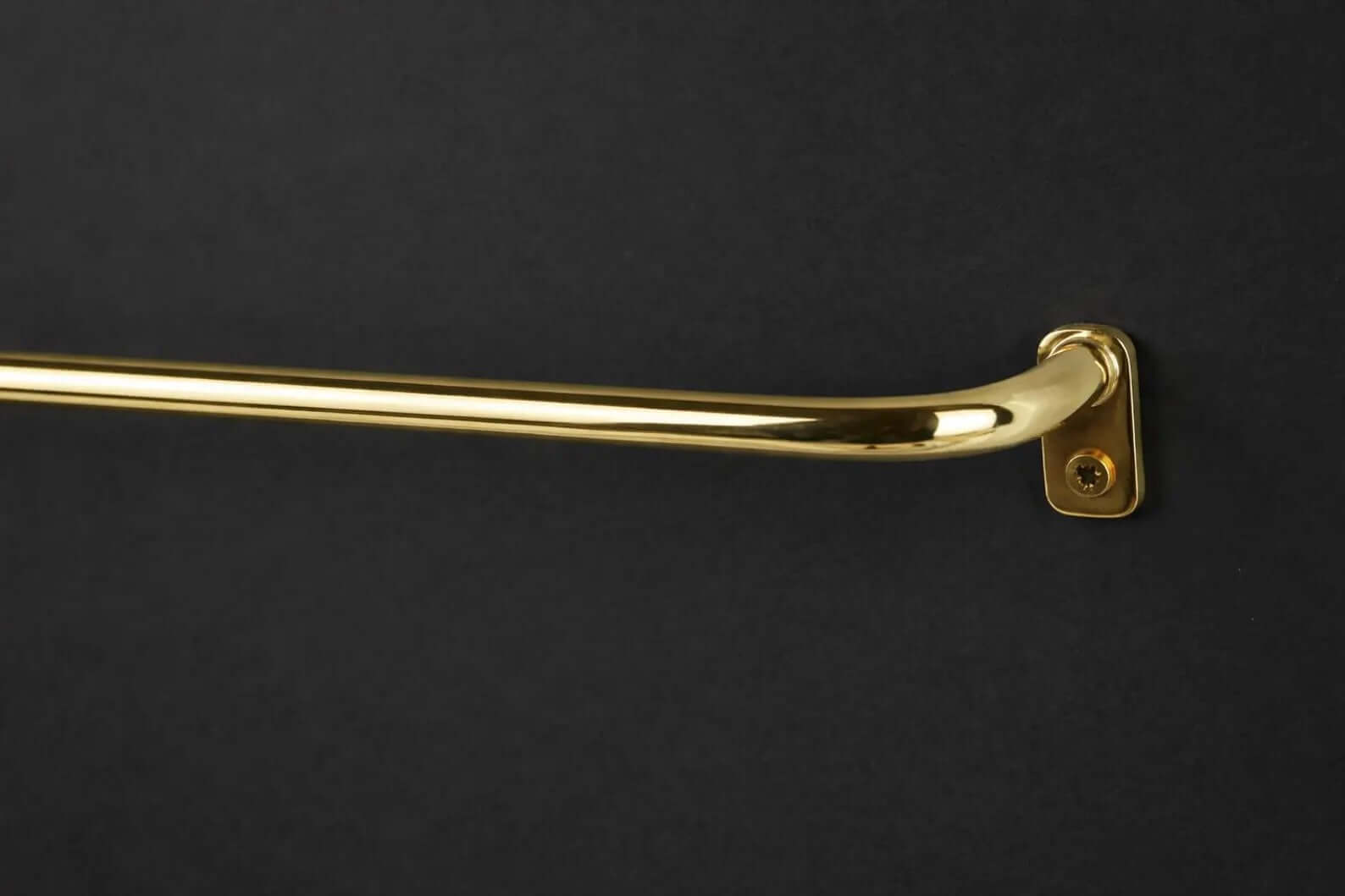thin solid brass curtain rod installation