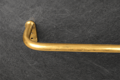 brass curtain rod with rings installed