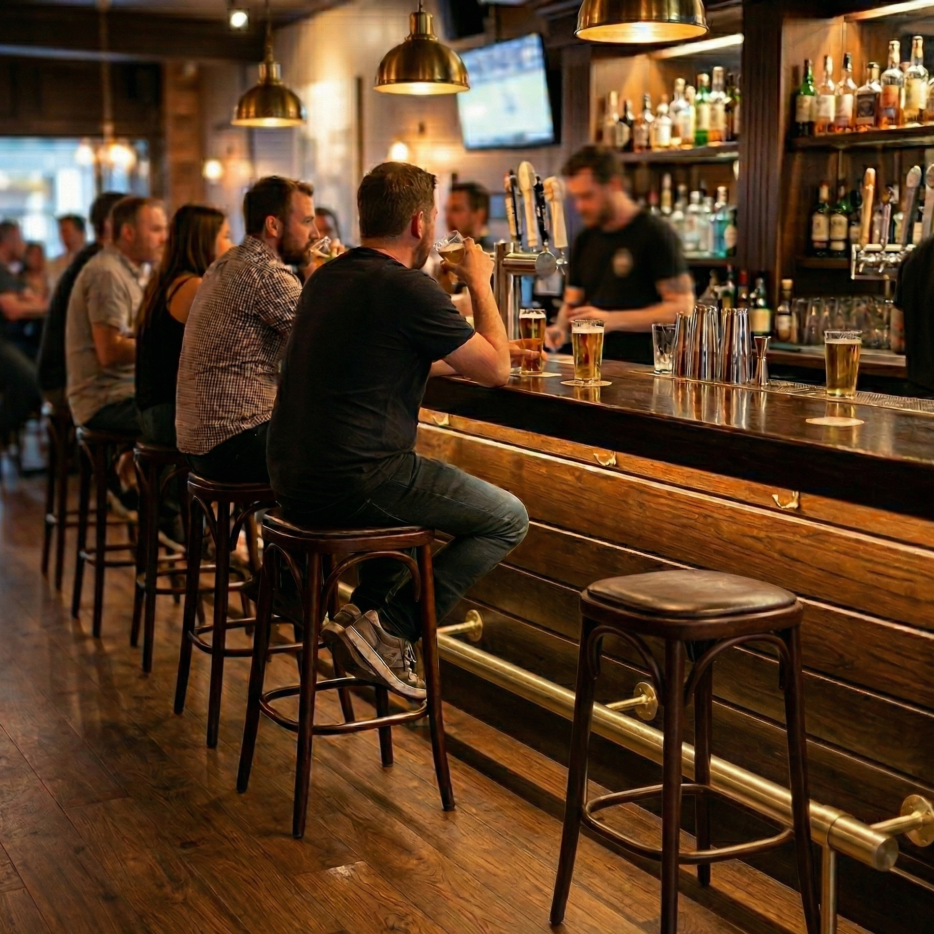 brass foot rail luxury bar interior