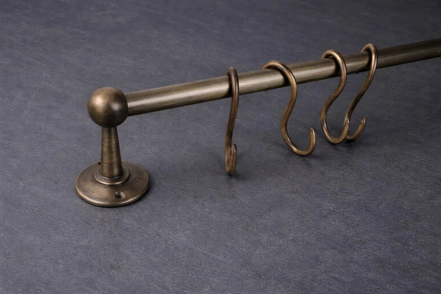 unlacquered brass pot rail close up detail