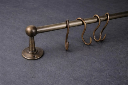 unlacquered brass pot rail close up detail