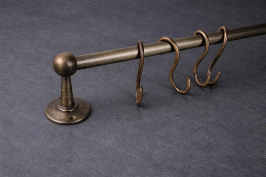 unlacquered brass pot rail close up detail