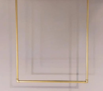 unlacquered brass hanger rack architectural styling