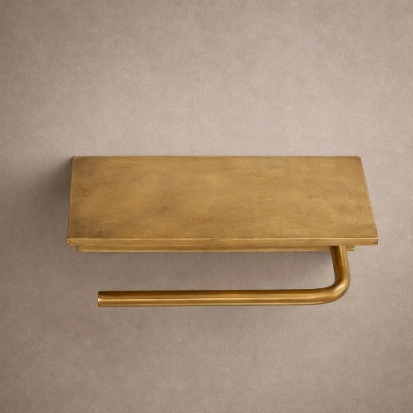 handcrafted brass toilet holder detail
