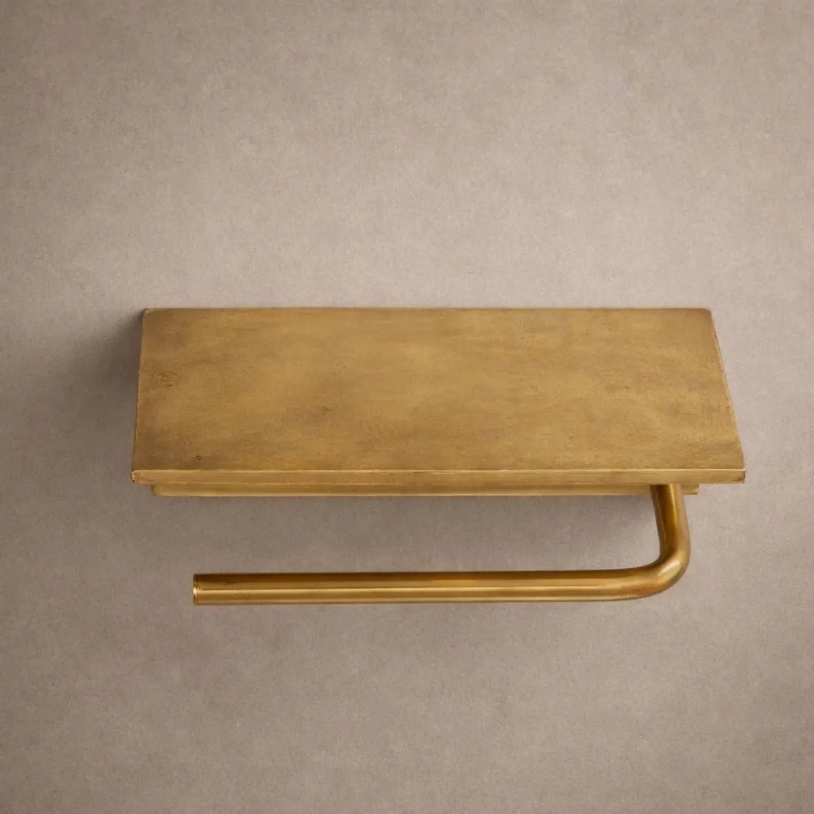 handcrafted brass toilet holder detail