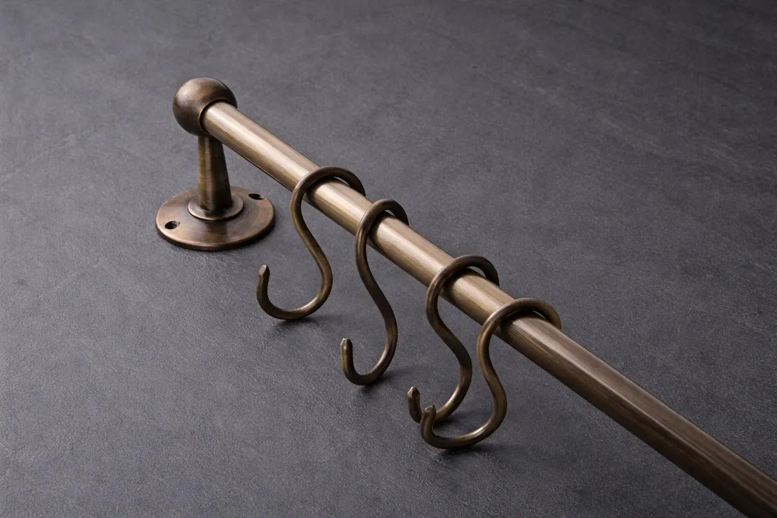 unlacquered brass pot rail close up detail