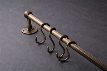 unlacquered brass pot rail close up detail