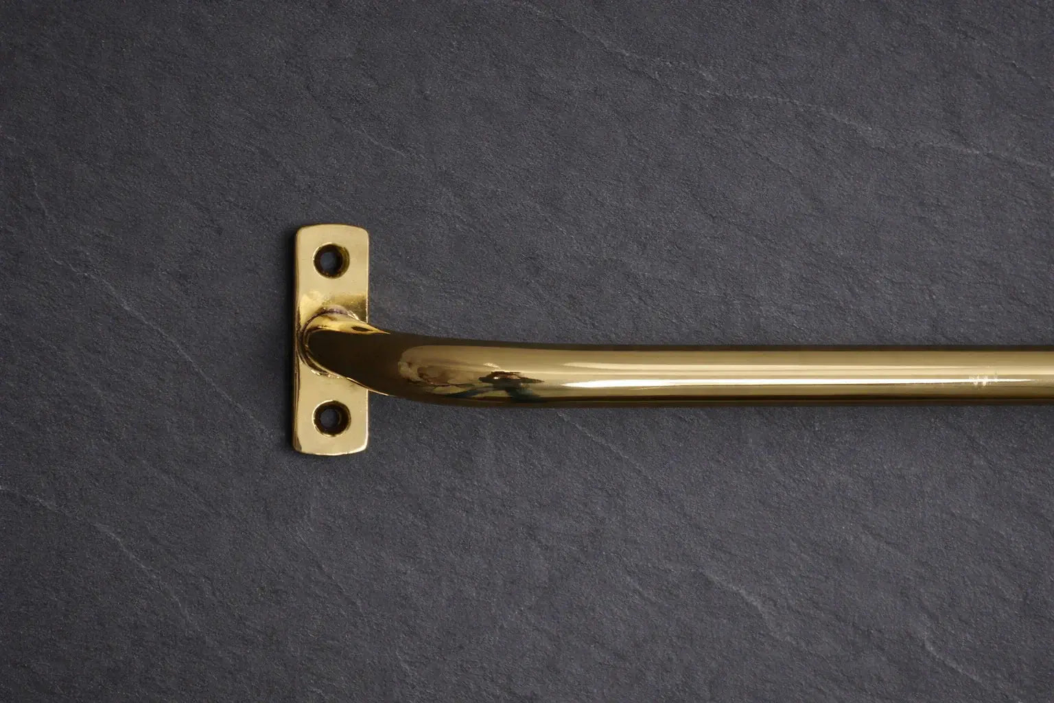 unlacquered brass curtain rod side view