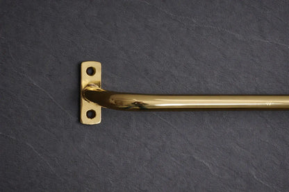 unlacquered brass curtain rod side view