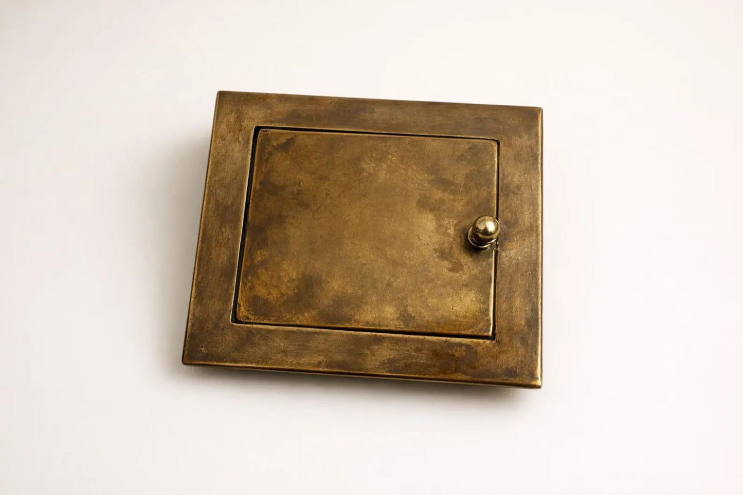 recessed brass toilet holder side view