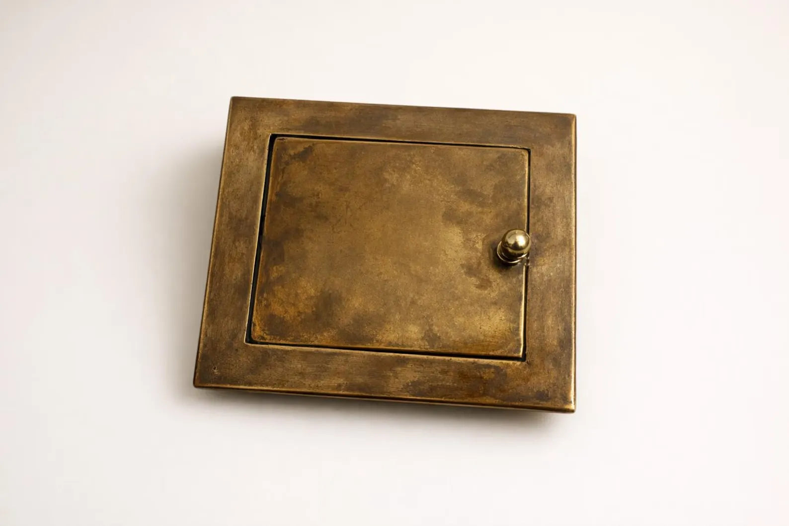 recessed brass toilet holder side view