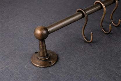 unlacquered brass pot rail close up detail