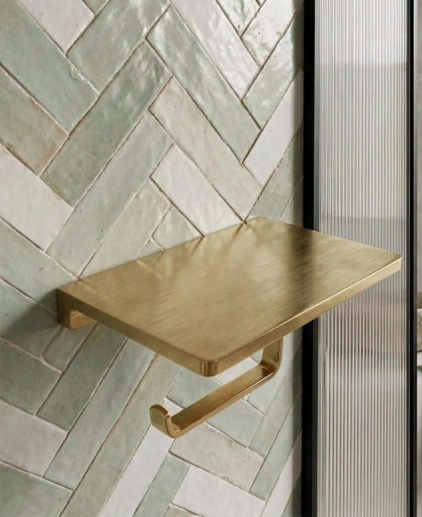 brass toilet paper holder modern interior
