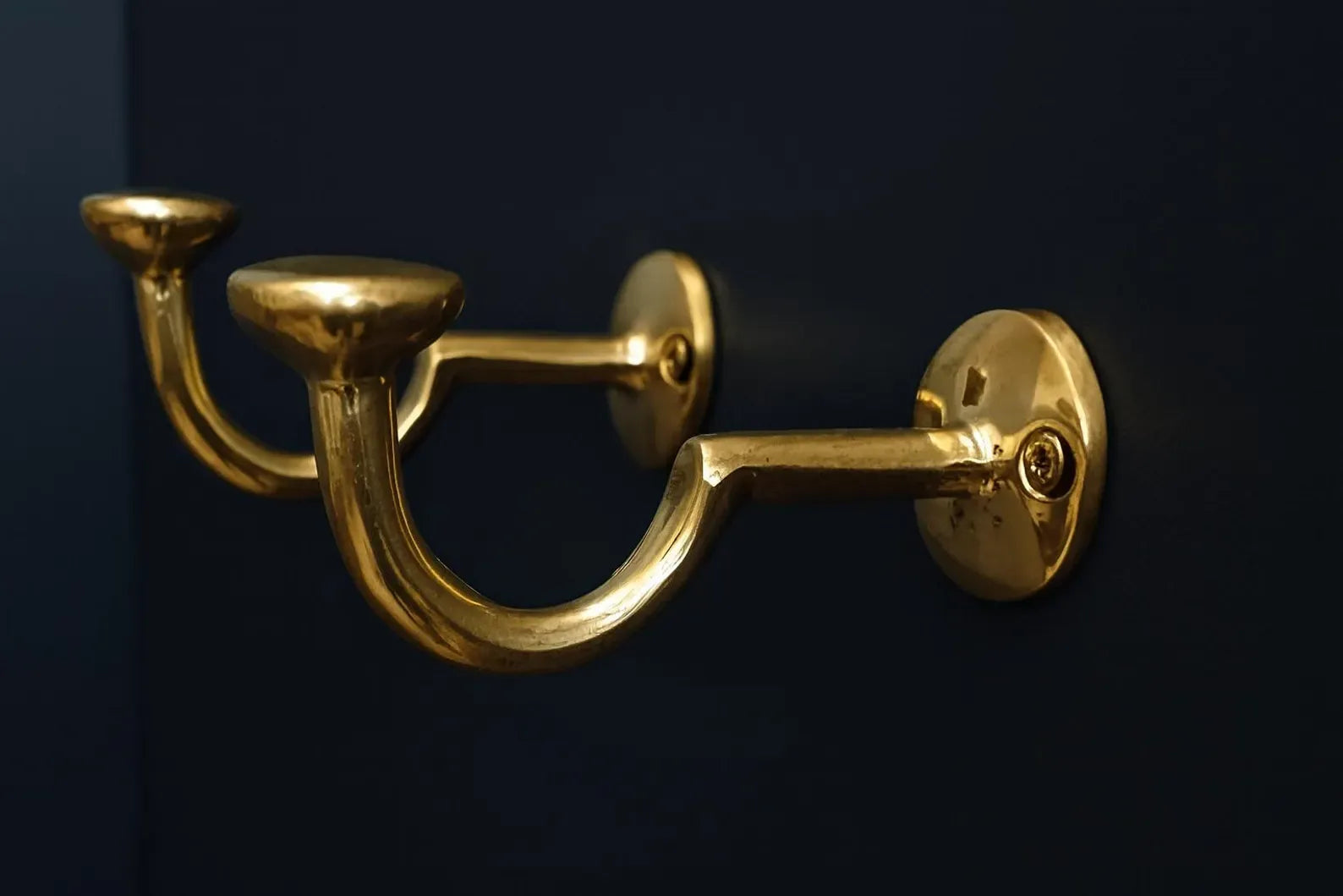 unlacquered brass wall hook side view